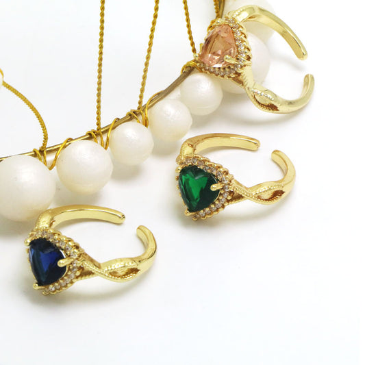 Open copper ring with a heart-shaped diamond