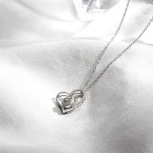 Personalized heart-shaped photo projection necklace with diamond