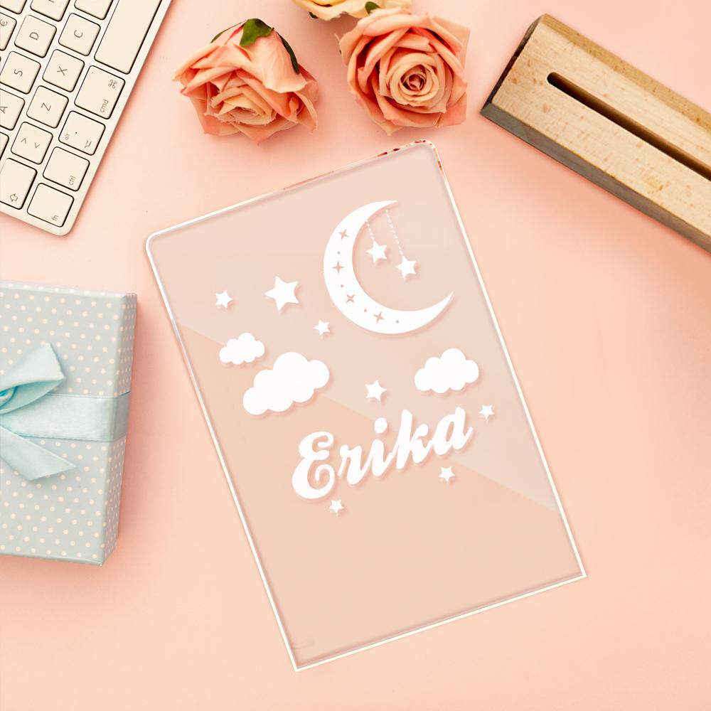 Personalized name night light for children, with a star, moon and cloud design.