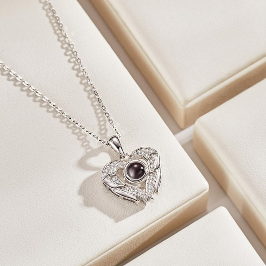 Personalized necklace with photo projection of angel wings
