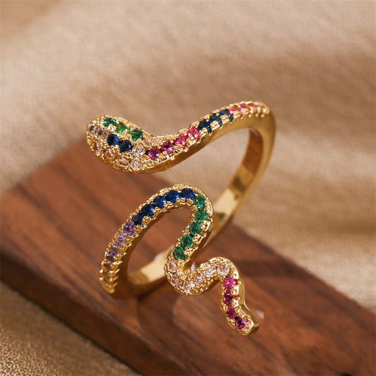 Adjustable ring in zircon and copper with a snake motif