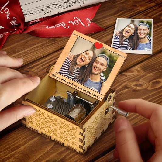 Personalized hand-cranked music box with photo and text