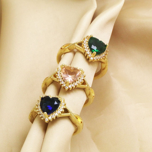 Open copper ring with a heart-shaped diamond