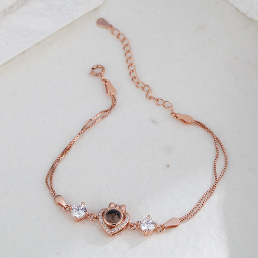 Personalized projection bracelet in the shape of a heart and bow tie in 925 sterling silver