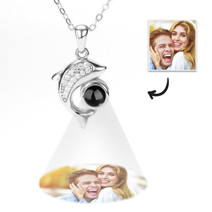 Personalized necklace with dolphin projection and diamonds