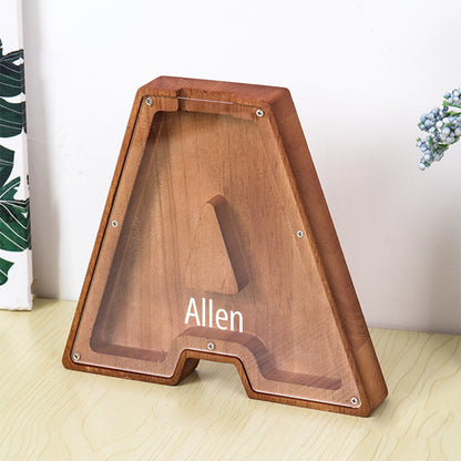 Tirelire personnalisée en bois avec 26 lettres et prénom.
