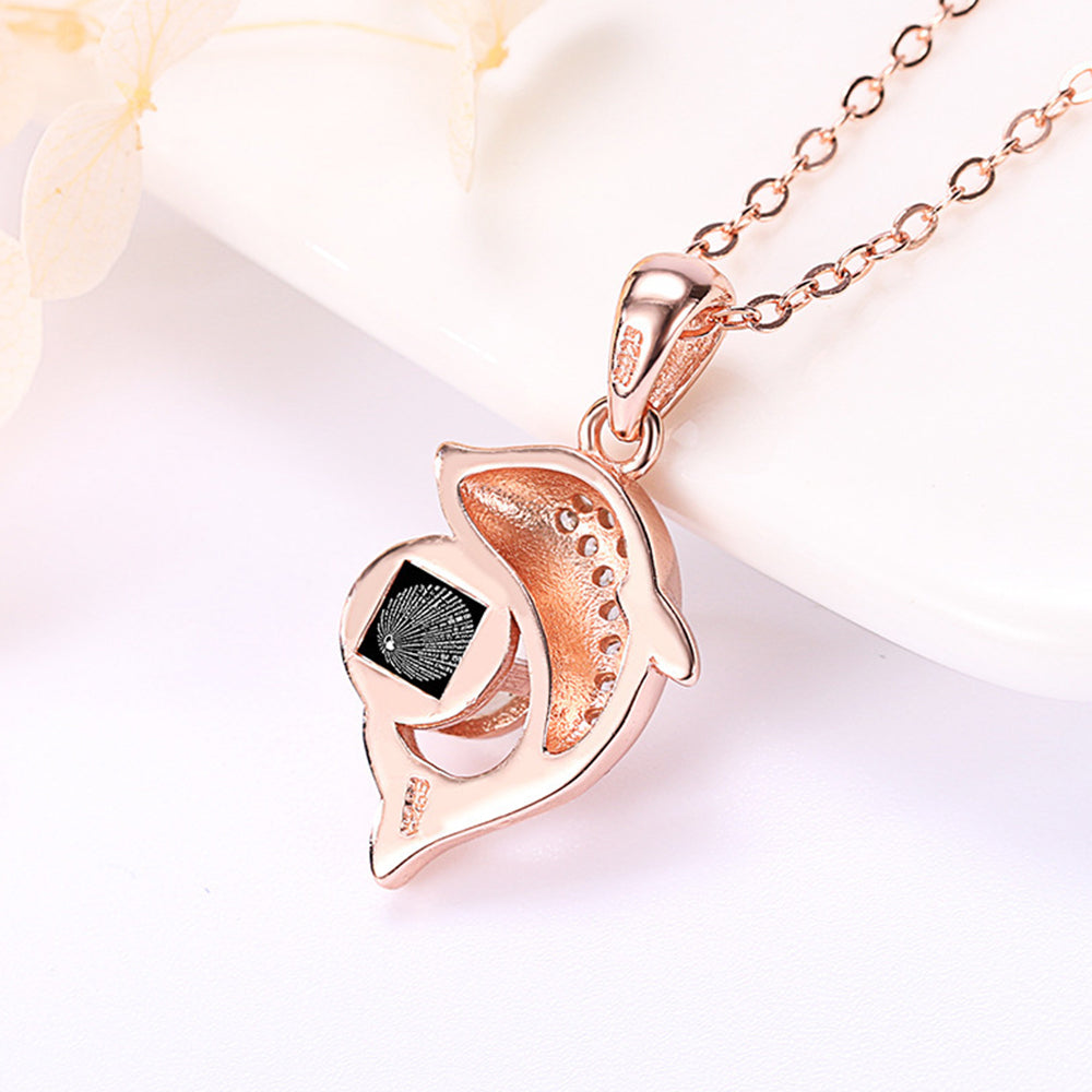 Personalized necklace with dolphin projection and diamonds