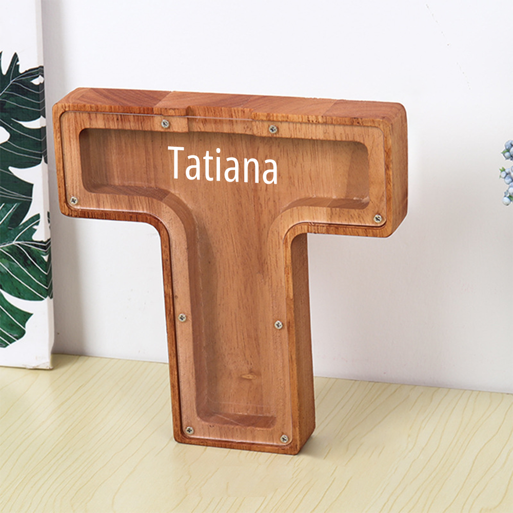 Tirelire personnalisée en bois avec 26 lettres et prénom.