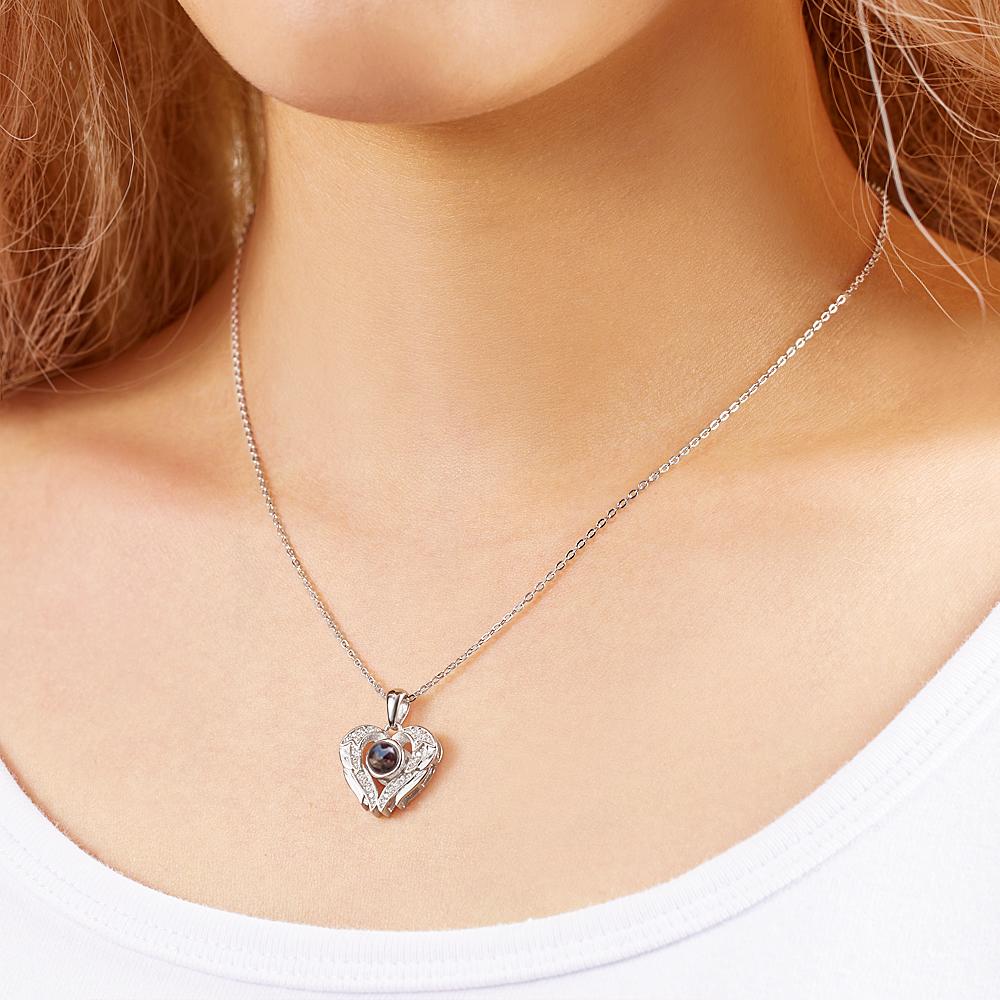 Personalized necklace with photo projection of angel wings