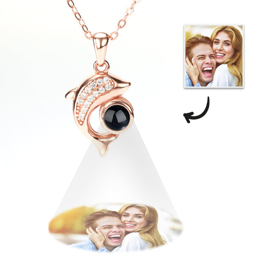 Personalized necklace with dolphin projection and diamonds
