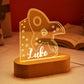 Personalized rocket-shaped name table lamp for children's room